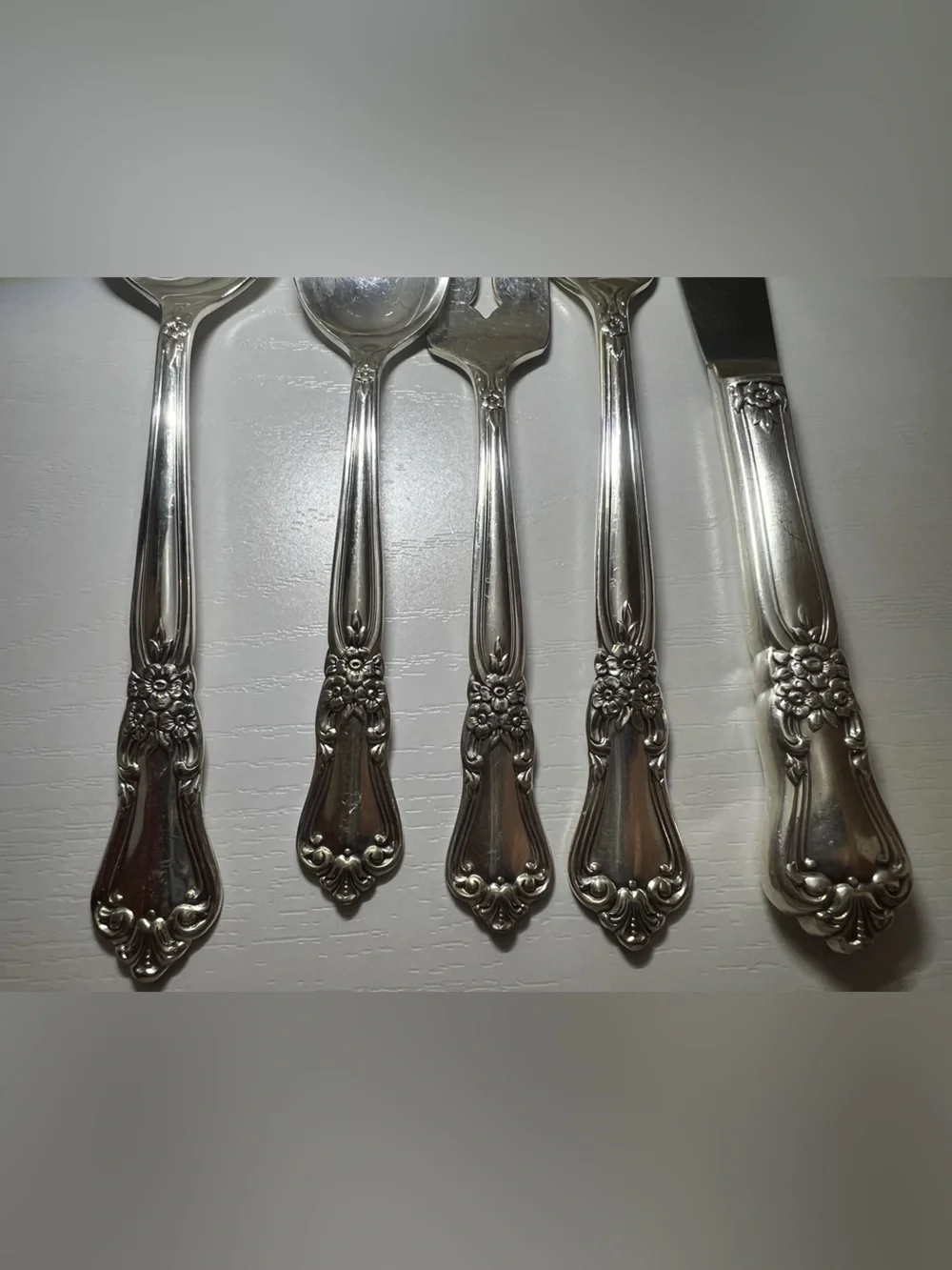 Stainless Set of Silverware (2 sets of spoons, 2 sets of forks, 1 set of knifes)